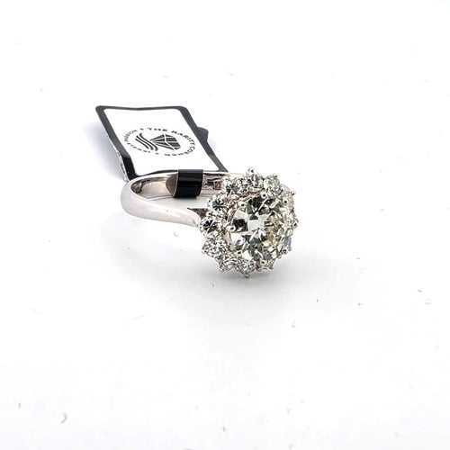 Bague 53 Bague en or blanc 18 ct avec diamant central et diamants 58 Facettes 12 B OC