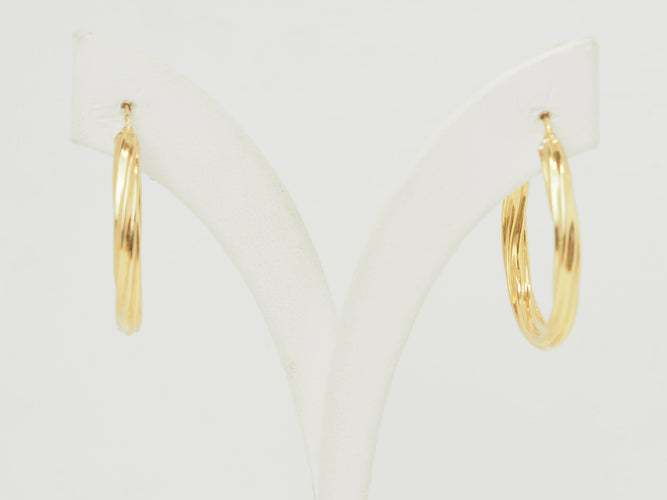 Boucles d'oreilles Boucles d'oreilles créoles torsadées en or jaune 18 carats 58 Facettes Mtor