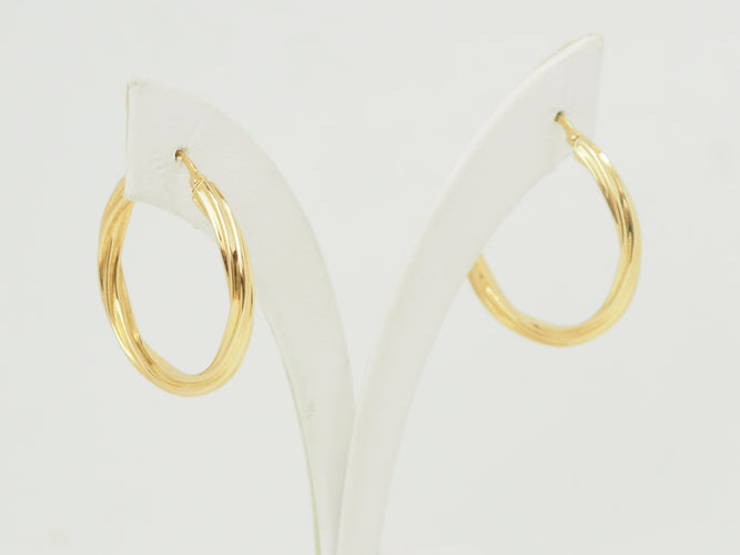 Boucles d'oreilles Boucles d'oreilles créoles torsadées en or jaune 18 carats 58 Facettes Mtor