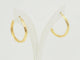 Boucles d'oreilles Boucles d'oreilles créoles torsadées en or jaune 18 carats 58 Facettes Mtor