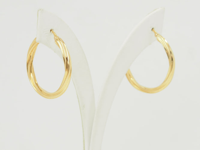 Boucles d'oreilles Boucles d'oreilles créoles torsadées en or jaune 18 carats 58 Facettes Mtor