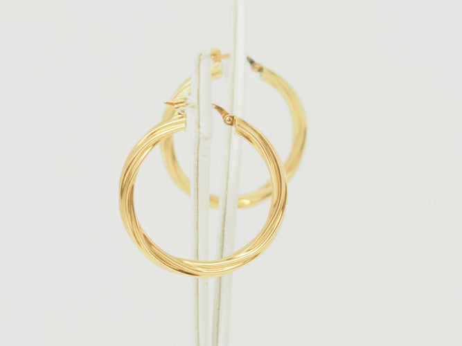 Boucles d'oreilles Boucles d'oreilles créoles torsadées en or jaune 18 carats 58 Facettes Mtor