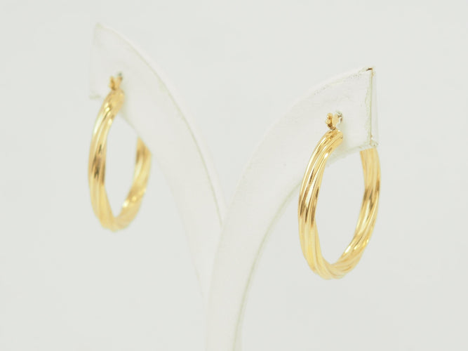 Boucles d'oreilles Boucles d'oreilles créoles torsadées en or jaune 18 carats 58 Facettes Mtor