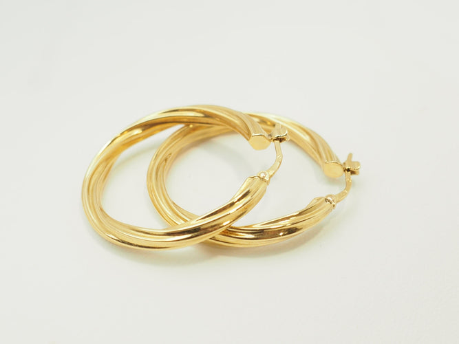 Boucles d'oreilles Boucles d'oreilles créoles torsadées en or jaune 18 carats 58 Facettes Mtor
