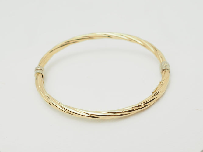 Bracelet Bracelet enfant ouvrant jonc torsadé en or jaune 58 Facettes 33634
