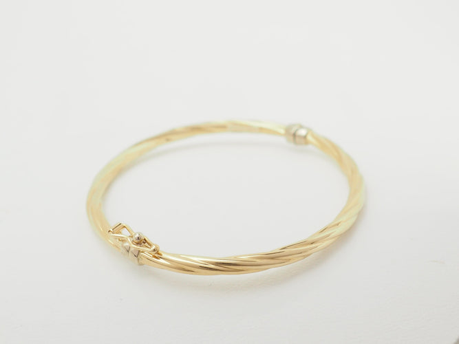 Bracelet Bracelet enfant ouvrant jonc torsadé en or jaune 58 Facettes 33634
