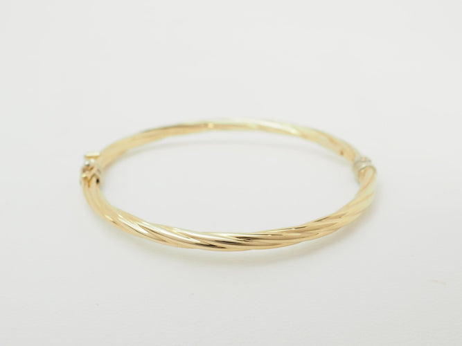 Bracelet Bracelet enfant ouvrant jonc torsadé en or jaune 58 Facettes 33634