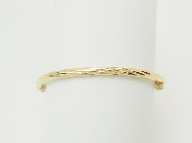 Bracelet Bracelet enfant ouvrant jonc torsadé en or jaune 58 Facettes 33634