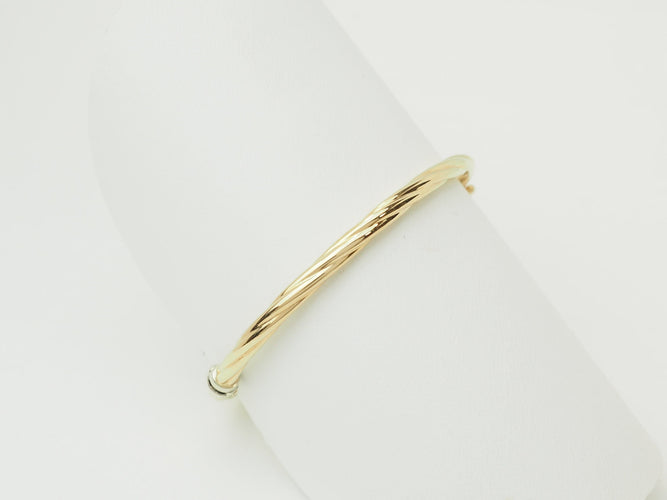 Bracelet Bracelet enfant ouvrant jonc torsadé en or jaune 58 Facettes 33634