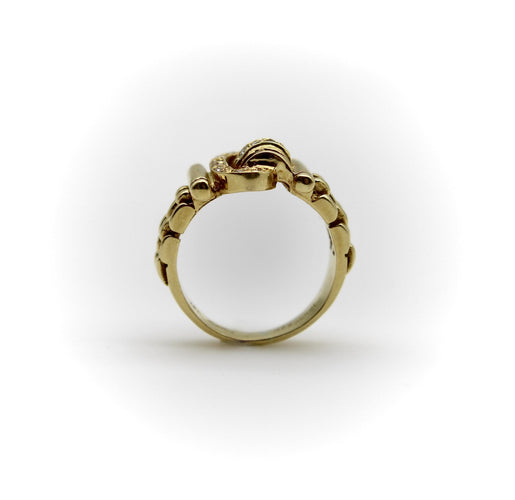 Bague 48 Bague boucle vintage en or 18K, diamants et rubis 58 Facettes A2009Q