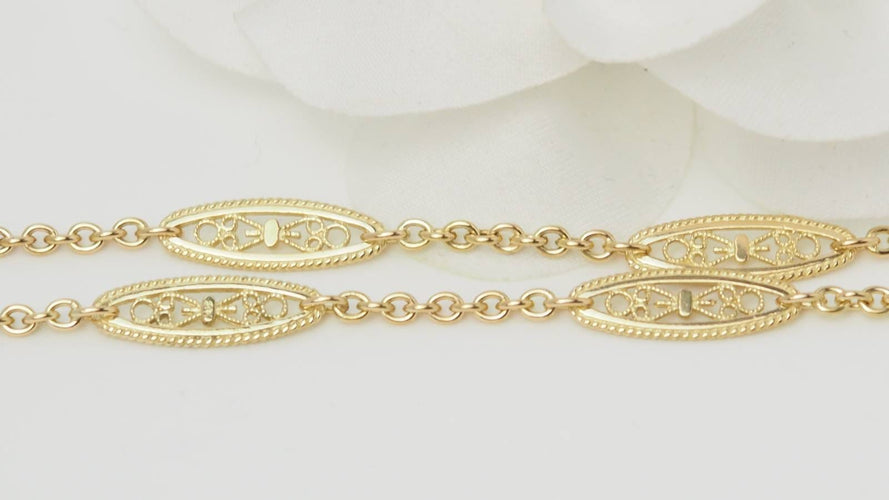 Collier Collier sautoir filigrane en or jaune 58 Facettes 32554