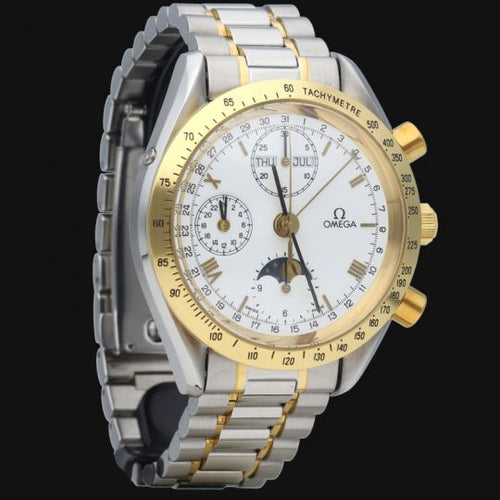 Montre Omega Speedmaster - Montre chronographe automatique en or jaune et acier 58 Facettes MT47060