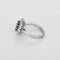 Bague 49 Bague marguerite en or gris, saphir et diamants 58 Facettes B260338