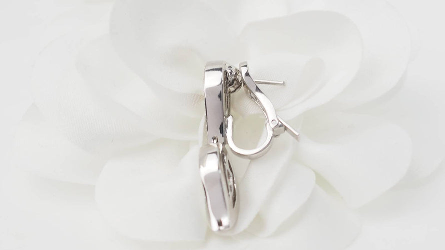 Boucles d'oreilles Boucles d'oreilles pendantes en or blanc, citrines et diamants 58 Facettes 32804