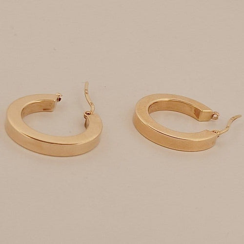 Boucles d'oreilles Créoles en or jaune 18 carats 58 Facettes 2584448