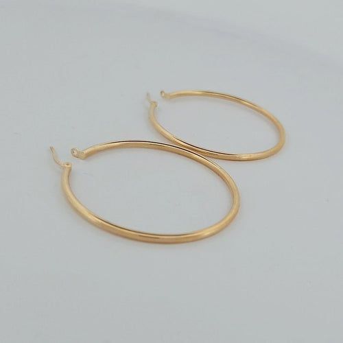 Boucles d'oreilles Créoles en or jaune 18 carats 58 Facettes 2752741