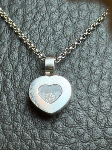 Collier Chopard Happy Diamonds - Collier cœur en or blanc et diamant mobile 58 Facettes Collier Chopard