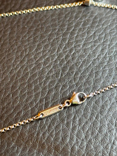 Collier Chopard Happy Diamonds - Collier cœur en or blanc et diamant mobile 58 Facettes Collier Chopard
