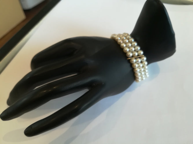 Bracelet Bracelet 3 rangs en or jaune et perles de culture 58 Facettes BRA 001