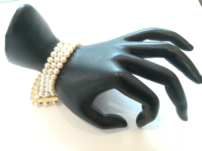 Bracelet Bracelet 3 rangs en or jaune et perles de culture 58 Facettes BRA 001