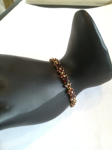 Boucles d'oreilles Demi-parure - Bracelet et boucles d'oreilles en or jaune et grenats 58 Facettes PAR 001