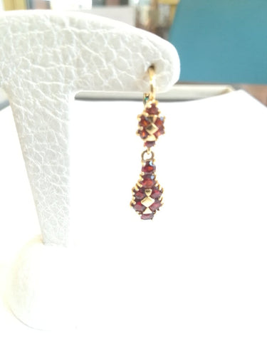 Boucles d'oreilles Demi-parure - Bracelet et boucles d'oreilles en or jaune et grenats 58 Facettes PAR 001