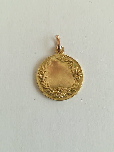 Pendentif Médaille Christ Enfant auréolé en or jaune 58 Facettes MED 001