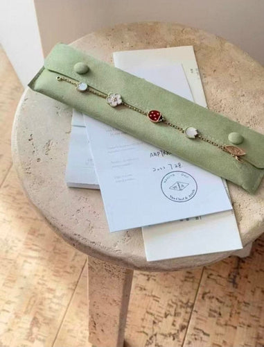 Bracelet Van Cleef & Arpels Lucky Spring - Bracelet 5 motifs en or rose et pierres 58 Facettes jnci89