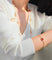 Bracelet Van Cleef & Arpels Lucky Spring - Bracelet 5 motifs en or rose et pierres 58 Facettes jnci89