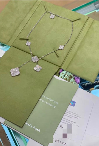 Collier Magic Alhambra - Collier 6 motifs en or blanc et diamants 58 Facettes jnci91