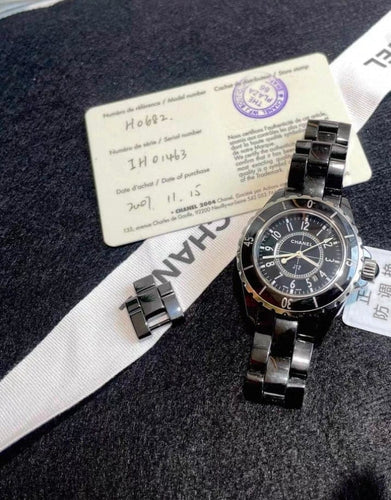 Montre Chanel J12 - Montre en acier, céramique et cadran noir 58 Facettes jnci98