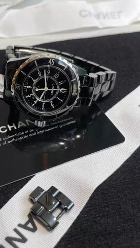 Montre Chanel J12 - Montre en acier, céramique et cadran noir 58 Facettes jnci98