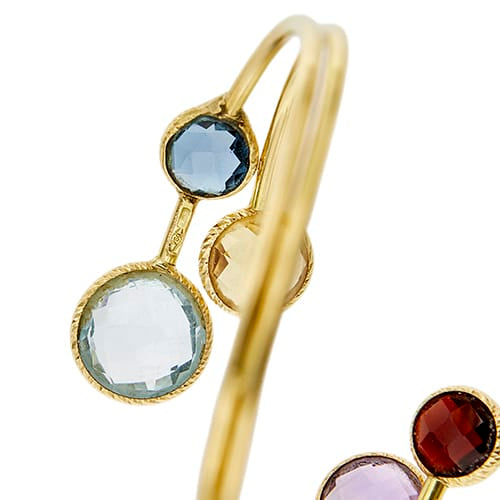 Bracelet Bracelet rigide contrarié en or jaune et pierres précieuses 58 Facettes 41831