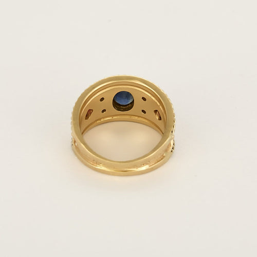 Bague 52 Bague d'archer en or jaune, saphir, diamants et rubis 58 Facettes B250394