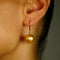 Boucles d'oreilles Boucles d'oreilles en or jaune 585 et perles des mers du Sud 58 Facettes E027