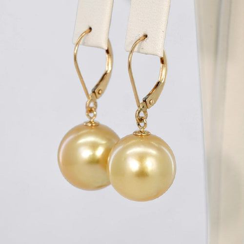 Boucles d'oreilles Boucles d'oreilles en or jaune 585 et perles des mers du Sud 58 Facettes E027