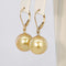 Boucles d'oreilles Boucles d'oreilles en or jaune 585 et perles des mers du Sud 58 Facettes E027