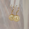 Boucles d'oreilles Boucles d'oreilles en or jaune 585 et perles des mers du Sud 58 Facettes E027