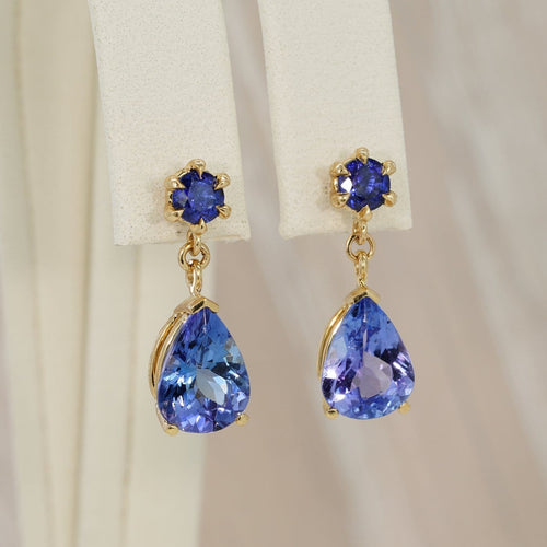Boucles d'oreilles Boucles d'oreilles en or jaune 14 ct, tanzanites et saphirs bleus 58 Facettes E028