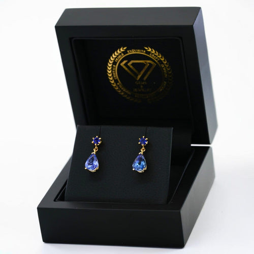 Boucles d'oreilles Boucles d'oreilles en or jaune 14 ct, tanzanites et saphirs bleus 58 Facettes E028