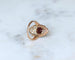 Bague 52 Bague marquise ancienne en or rose, spinelle rouge et diamants 58 Facettes