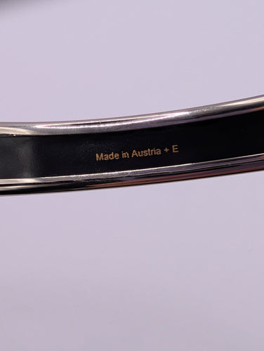 Bracelet Hermès Calèche - Bracelet jonc en acier et émail 58 Facettes 1250