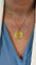 Pendentif Augis - Médaille d’amour en or jaune, rubis et diamants 58 Facettes Médaille 1