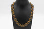 Collier Bootjes ketting - Collier hollandais en or jaune et grenats 58 Facettes 12229