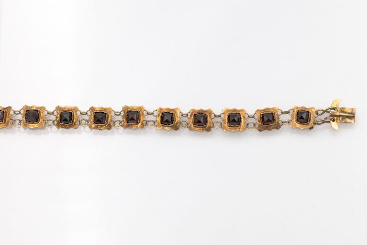 Bracelet Bracelet hollandais XIXe en or jaune et grenats 58 Facettes 12227