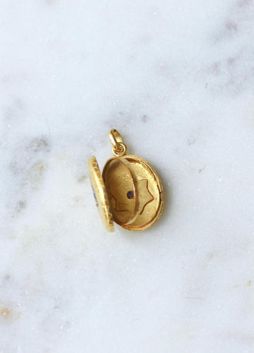 Pendentif Pendentif médaillon étoile en or jaune, rubis, saphir et diamants 58 Facettes