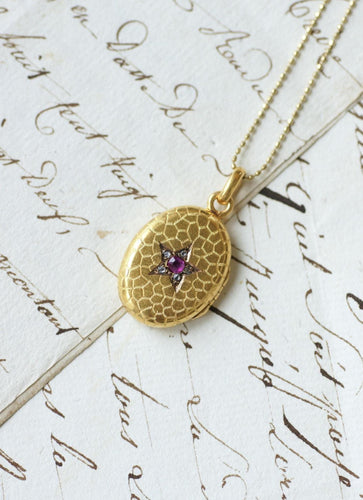 Pendentif Pendentif médaillon étoile en or jaune, rubis, saphir et diamants 58 Facettes