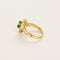 Bague 48 Bague marguerite en or jaune 18K, émeraude et diamants 58 Facettes B260207
