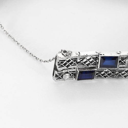 Bracelet Bracelet articulé en or blanc, diamants et saphirs de synthèse 58 Facettes B260353