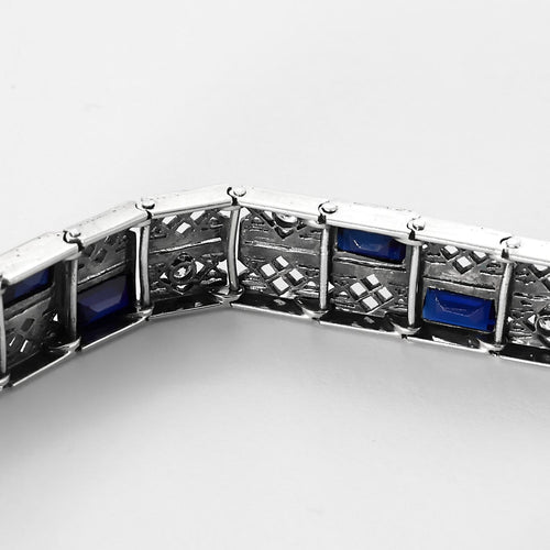 Bracelet Bracelet articulé en or blanc, diamants et saphirs de synthèse 58 Facettes B260353